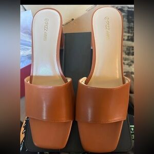 Tan Leather Mules with Flat Sole and Minimalist Design